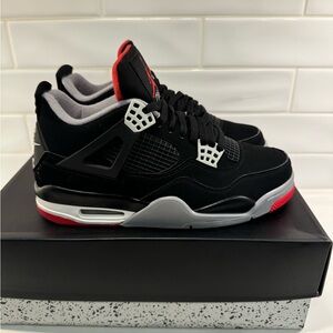 Jordan Black and Red Sneakers Iconic Design Jordan 4 Bred